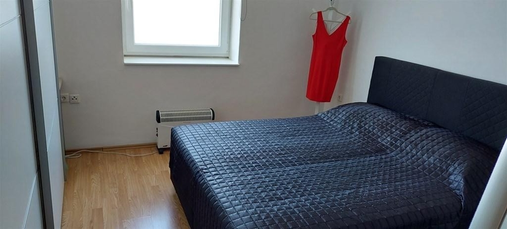 Spálňa s manželskou posteľou.