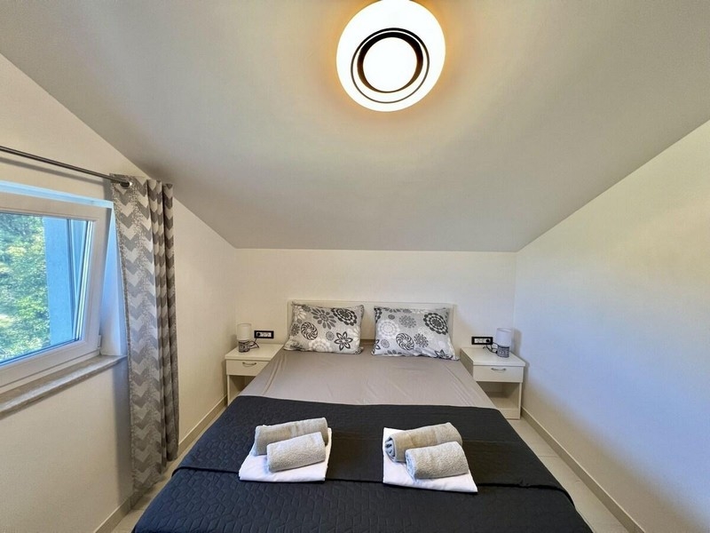 Spálňa s manželskou posteľou