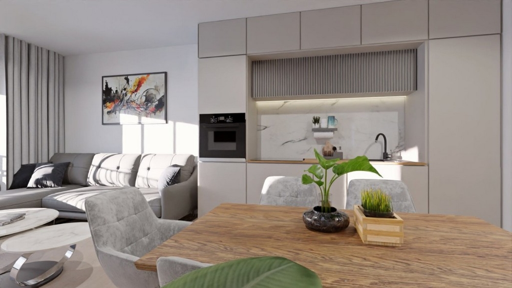 Otvorená kuchyňa-obývacia izba s útulným jedálenským kútom a moderným zariadením.