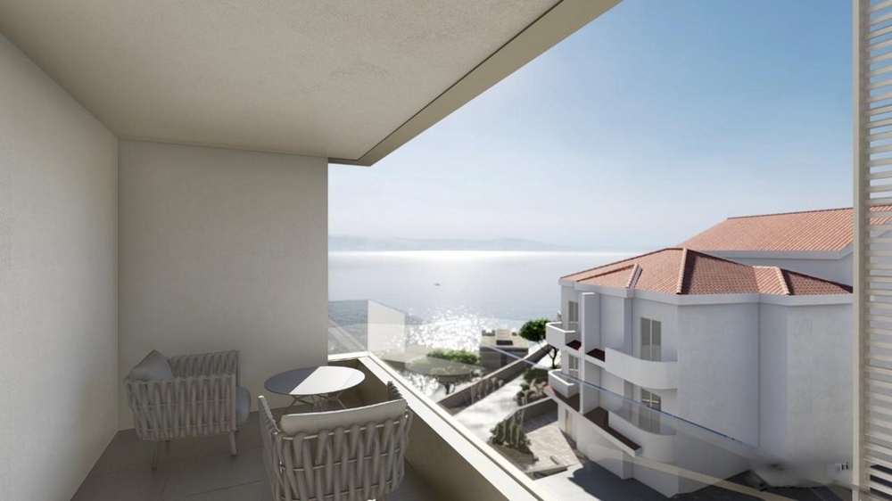 Vonkajší pohľad na modernú obytnú budovu so známkami 