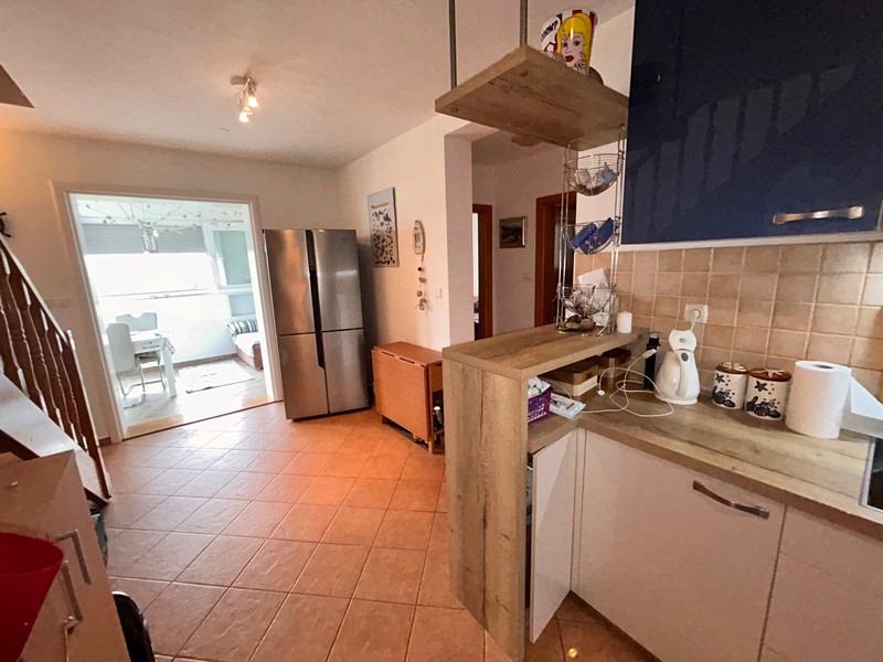 Kuchyňa a jedáleň a chodba.