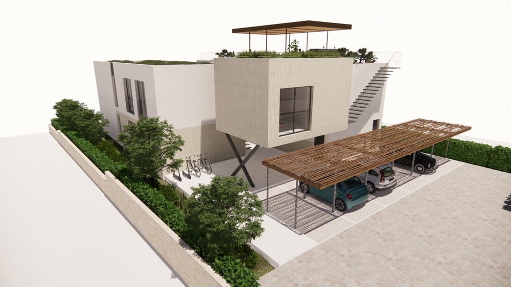 Zadná časť budovy s krytým parkovaním.