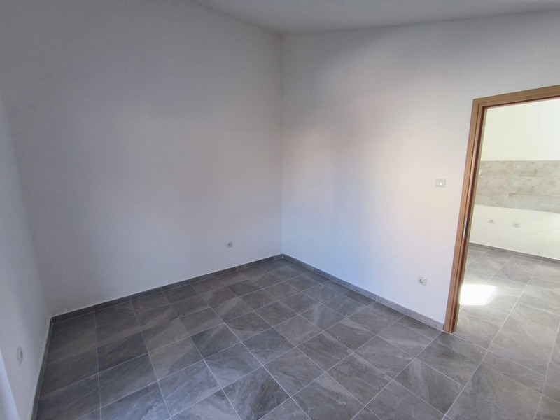 Spálňa s prepojením na kuchyňu