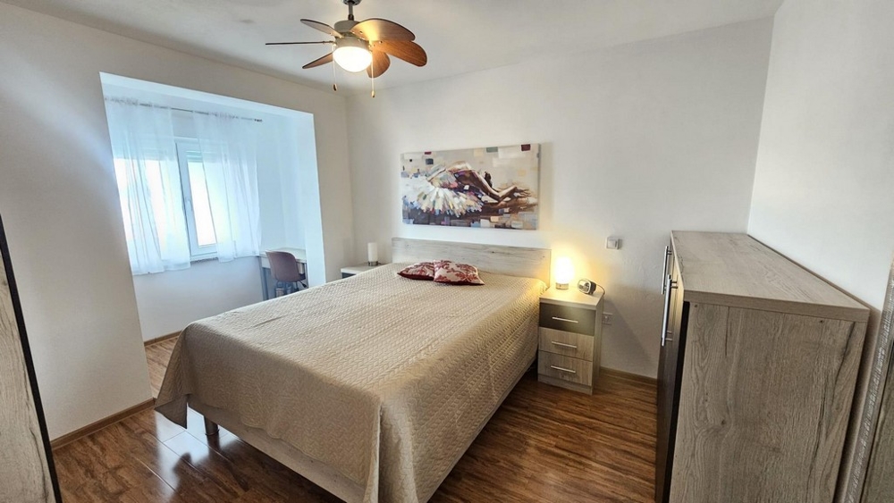 Spálňa s manželskou posteľou