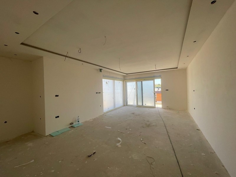 Obývacia časť s výstupom na terasu