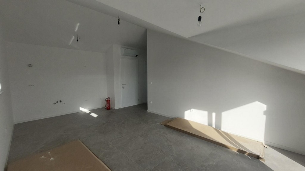 Obývacia izba spojená s kuchyňou