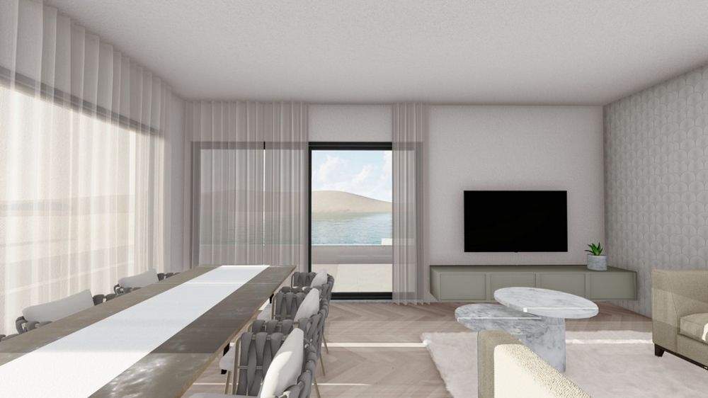 Moderná obývacia izba a jedálenský kút s priamym prístupom na terasu a výhľadom na more