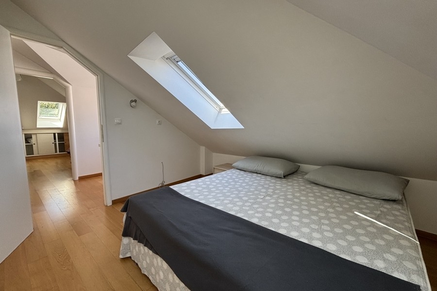 Spálňa s manželskou posteľou.