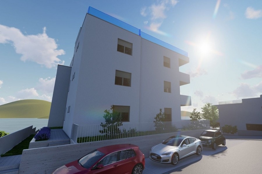 Apartmánový dom s parkovacími miestami a výhľadom na more