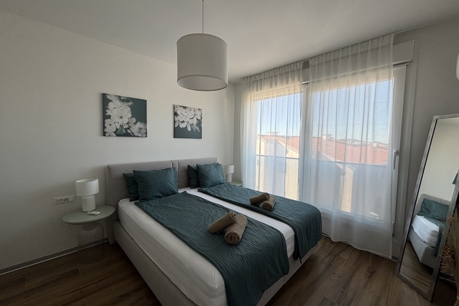 Spálňa s manželskou posteľou v penthouse v Trogire na Čiove