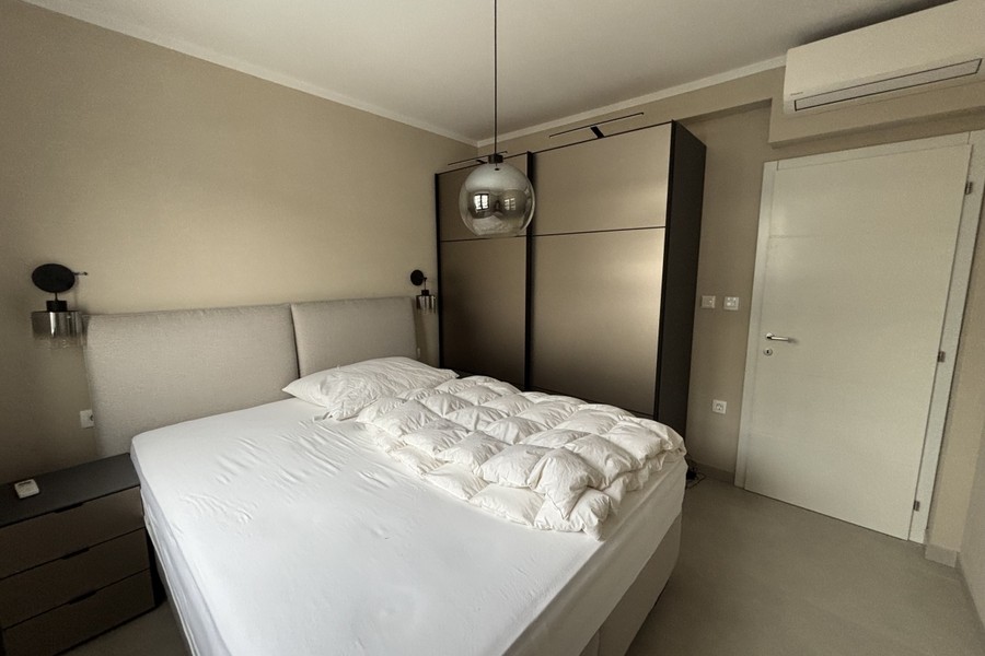 Spálňa strešného apartmánu v Okrug Gornji