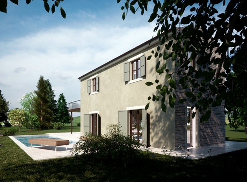 Pohľad na nehnuteľnosť na Istrii s výhľadom na more, obklopený červenými listami a jasnou oblohou.