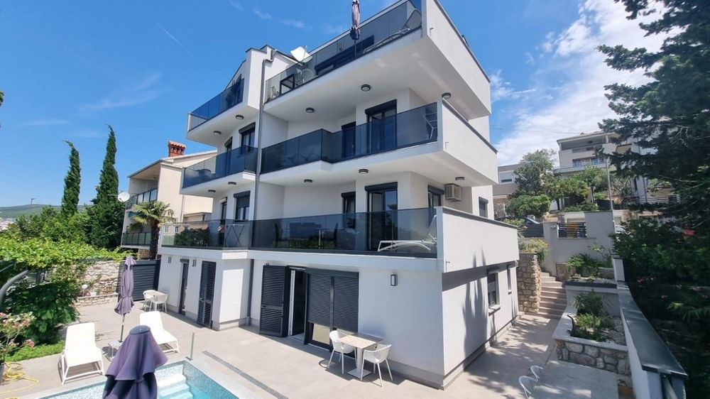 Apartmánový dom s bazénom