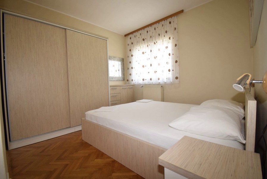 Spálňa s manželskou posteľou.