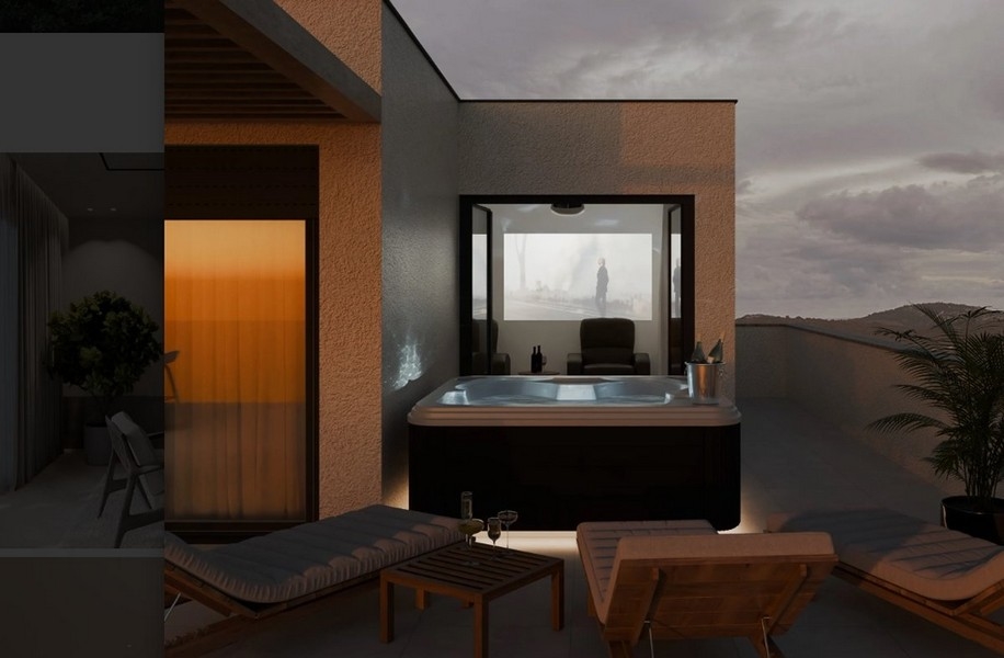 Útulné domáce kino s dvoma kreslami, premietacím plátnom a fľašou vína na príručnom stolíku vo vile s výhľadom na more