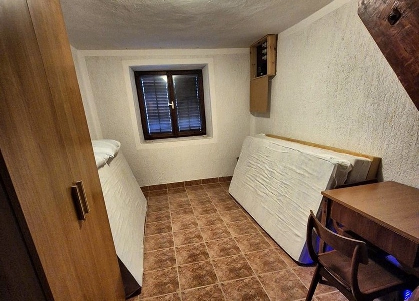 Spálňa nehnuteľnosti H3401 v Chorvátsku.