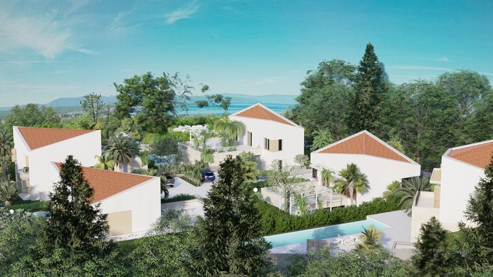 Vilový komplex s bazénmi a bujnou vegetáciou