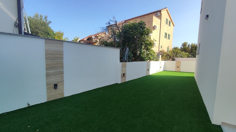 Zelená vonkajšia časť domu.