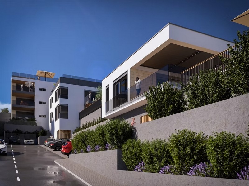 Obytný komplex s modernými budovami na svahu