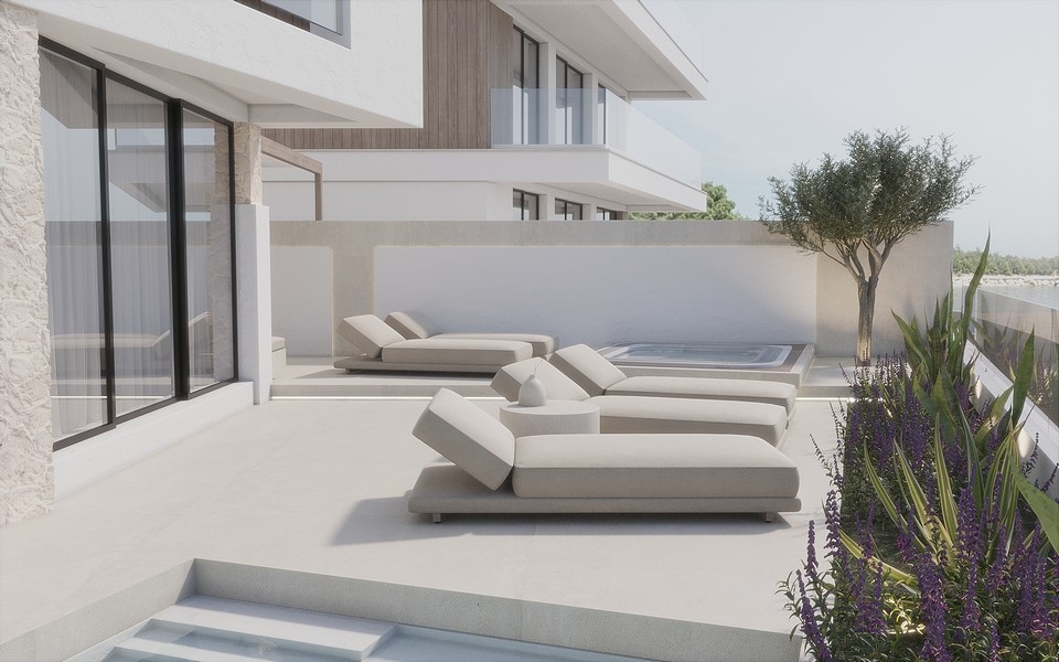 Terasa s modernými ležadlami.