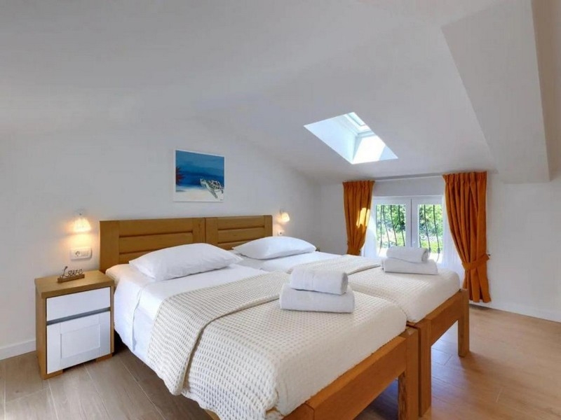 Podkrovná spálňa s dvomi samostatnými lôžkami