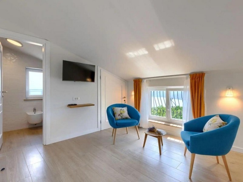 Podkrovná spálňa s posedením