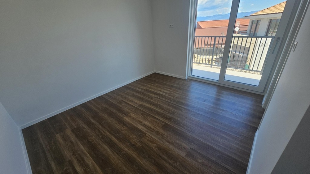 Spálňa s prístupom na balkón v Chorvátsku
