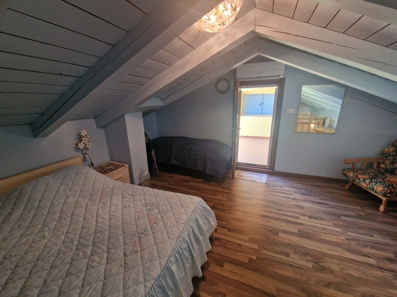 Spálňa pod podkrovím s výstupom na terasu